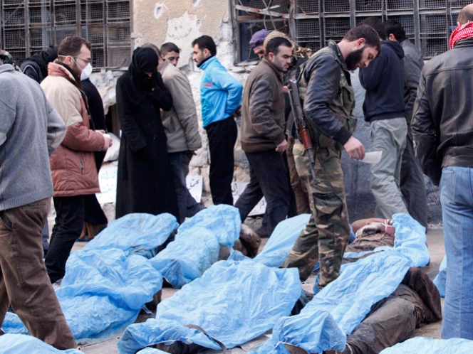 Hallan en ciudad siria 65 cuerpos de jóvenes con las manos atadas